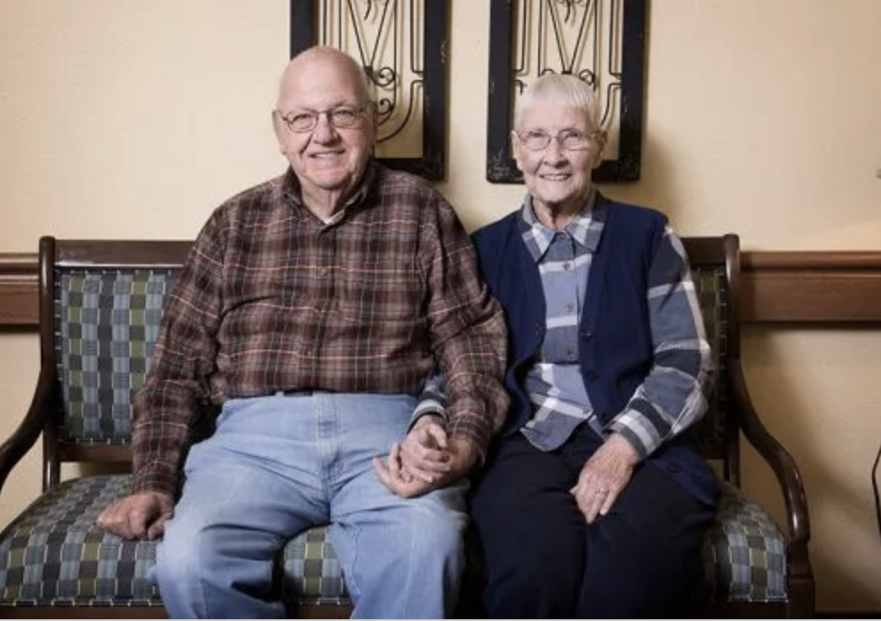 Senior couple posing for a photo